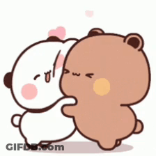 A Couple Of Bears Are Hugging Each Other . GIF