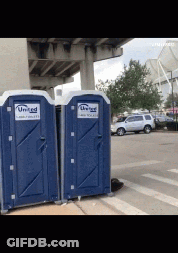 A Couple Of Blue Portable Toilets That Say United GIF