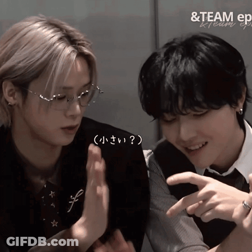 A Couple Of Boys Are Sitting Next To Each Other With The Words & Team Ep Written On The Bottom GIF