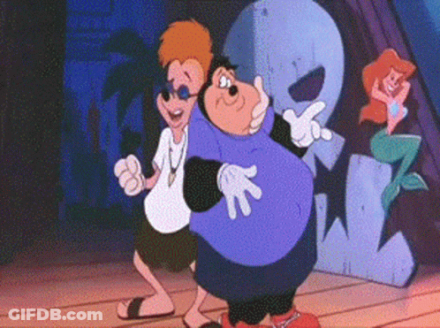 A Couple Of Cartoon Characters Are Standing Next To Each Other On A Stage . GIF