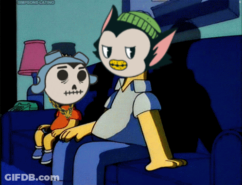 A Couple Of Cartoon Characters Sitting On A Couch With The Words Simpsons-Latino Visible In The Corner GIF