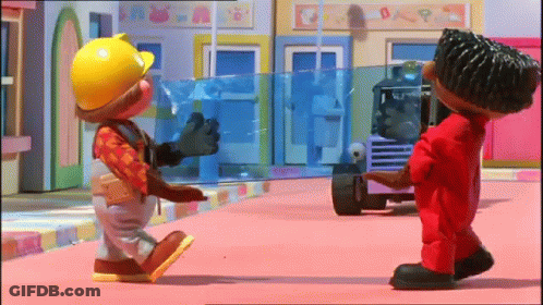 A Couple Of Cartoon Characters Standing Next To Each Other . GIF