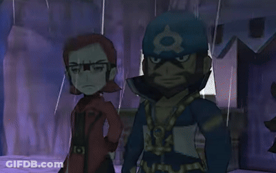 A Couple Of Cartoon Characters Standing Next To Each Other In A Dark Room GIF