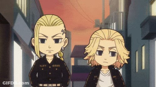 A Couple Of Cartoon Characters Standing Next To Each Other With One Having A Tattoo On His Chest GIF
