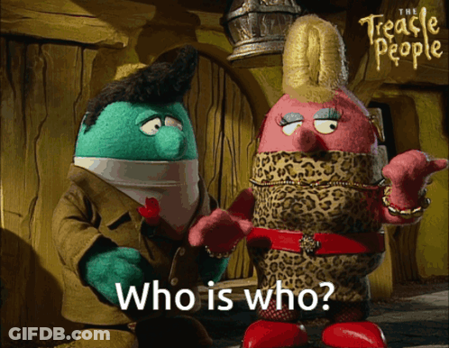 A Couple Of Cartoon Characters Standing Next To Each Other With The Words Who Is Who Below Them GIF