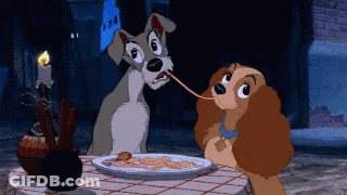 A Couple Of Cartoon Dogs Are Eating Spaghetti At A Table GIF