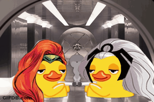 A Couple Of Cartoon Ducks Are Sitting Next To Each Other In A Room GIF
