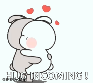 A Couple Of Cartoon Rabbits Hugging Each Other With The Words `` Hug Incoming '' . GIF