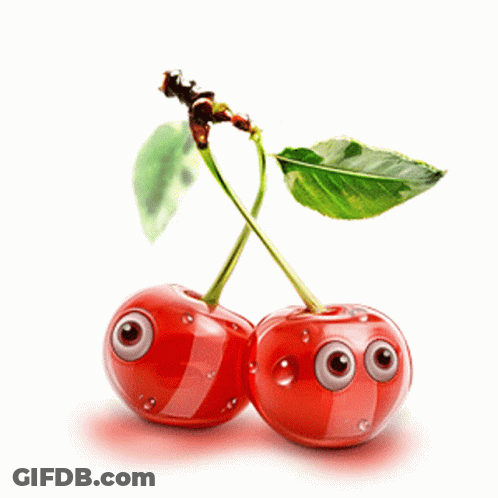 A Couple Of Cherries With Big Eyes And A Green Leaf GIF
