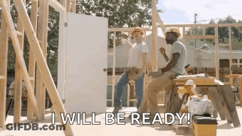 A Couple Of Construction Workers Are Sitting On A Stool In Front Of A House Under Construction . GIF