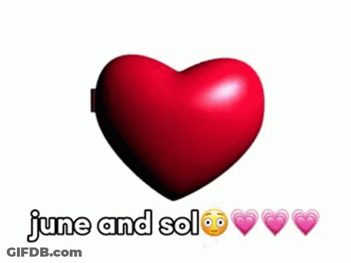 A Couple Of Girls Are Standing Next To Each Other In A Heart Shaped Frame . GIF