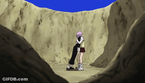 A Couple Of Girls Hugging Each Other In The Desert GIF