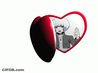 A Couple Of Heart Shaped Mirrors With Cartoon Characters On Them GIF