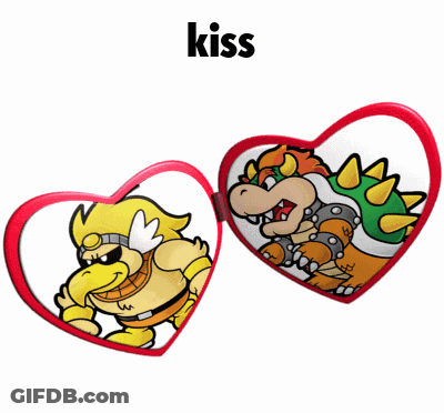 A Couple Of Hearts With Cartoon Characters Inside Of Them And The Word Kiss Below Them GIF