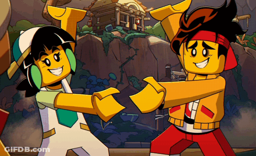 A Couple Of Lego Characters Are Dancing Together GIF