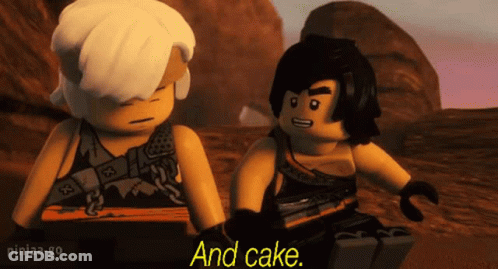 A Couple Of Lego Ninjago Characters Sitting Next To Each Other . GIF