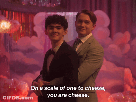 A Couple Of Men Hugging Each Other With The Words On A Scale Of One To Cheese You Are Cheese GIF