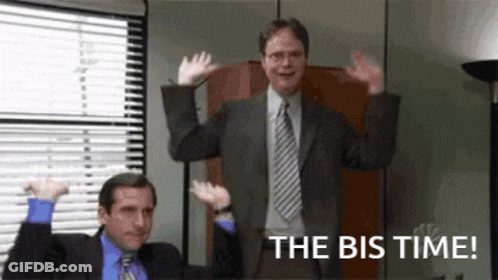 A Couple Of Men In Suits And Ties Are Standing Next To Each Other With Their Arms In The Air . GIF