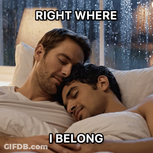 A Couple Of Men Laying In Bed With The Caption Right Where I Belong GIF