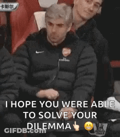 A Couple Of Men Sitting Next To Each Other With The Words `` I Hope You Were Able To Solve Your Dilemma '' On The Bottom GIF