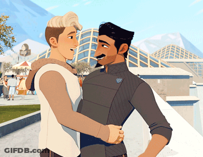 A Couple Of Men Standing Next To Each Other With A Building In The Background GIF