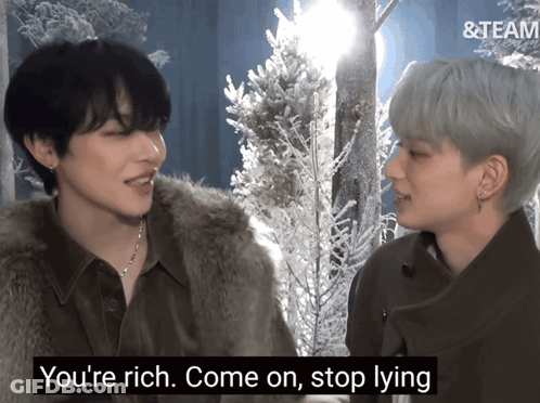 A Couple Of Men Standing Next To Each Other With The Words " You 'Re Rich Come On Stop Lying " Below Them GIF