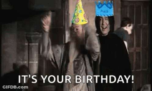 A Couple Of Men Wearing Party Hats Are Standing Next To Each Other And Saying `` It 'S Your Birthday ! '' GIF