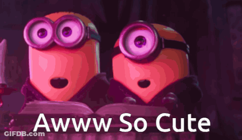 A Couple Of Minions Sitting Next To Each Other With The Words Awww So Cute On The Bottom GIF