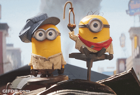 A Couple Of Minions Standing Next To Each Other One Wearing A Hat GIF
