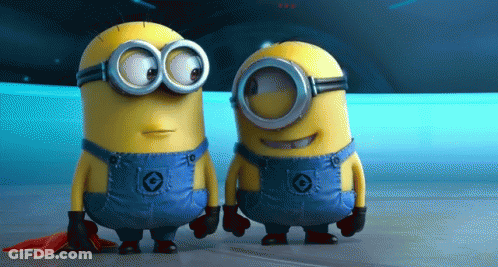 A Couple Of Minions Standing Next To Each Other With One Wearing Overalls With The Number 10 On Them GIF