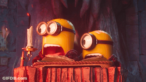 A Couple Of Minions With Their Mouths Open GIF