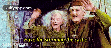 A Couple Of Old People Are Standing Next To Each Other With The Words Have Fun Storming The Castle On The Bottom GIF