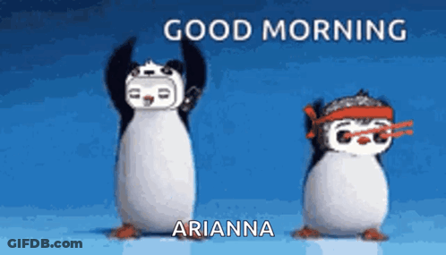 A Couple Of Penguins Are Standing Next To Each Other With Their Arms In The Air . GIF