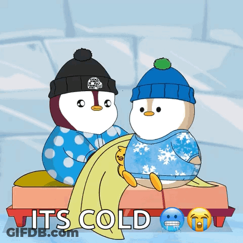 A Couple Of Penguins Sitting On A Bench With The Words It 'S Cold Above Them GIF
