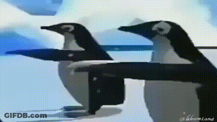 Penguins Standing With Arms Outstretched GIF