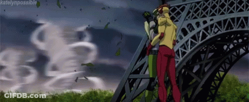 A Couple Of People Are Standing On Top Of A Very Tall Building . GIF