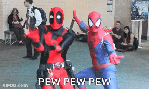 A Couple Of People Dressed Up As Deadpool And Spider-Man GIF