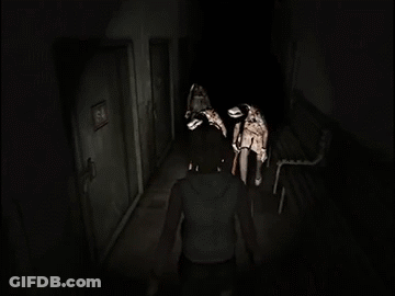 A Couple Of People Standing In A Dark Hallway Holding Sticks GIF