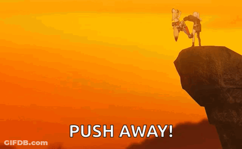 A Couple Of People Standing On Top Of A Cliff . GIF