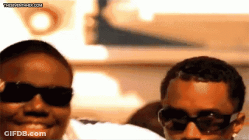 People Wearing Sunglasses Smiling Seventhhex.com GIF
