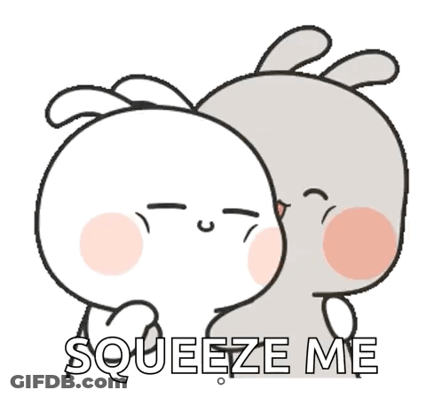 A Couple Of Rabbits Hugging Each Other With The Words `` Squeeze Me '' On The Bottom . GIF