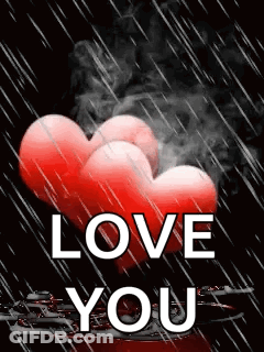 A Couple Of Red Hearts With Smoke Coming Out Of Them And The Words `` I Love You '' GIF
