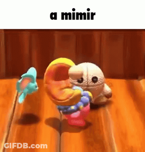 A Couple Of Stuffed Animals Are Dancing On A Wooden Table With A Caption That Says A Mimir . GIF