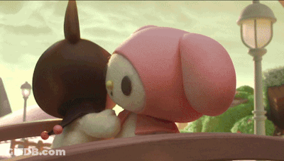 A Couple Of Stuffed Animals Are Hugging Each Other GIF