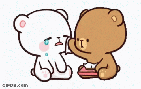 A Couple Of Teddy Bears Are Sitting Next To Each Other . GIF