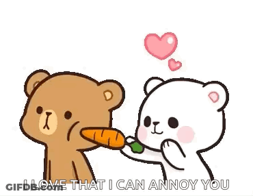 A Couple Of Teddy Bears Are Standing Next To Each Other And One Of Them Is Feeding The Other A Carrot . GIF