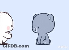 A Couple Of Teddy Bears Are Standing Next To Each Other . GIF