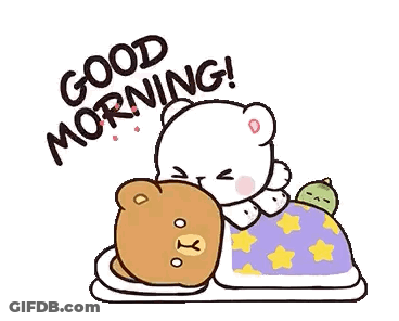A Couple Of Teddy Bears Laying Next To Each Other On A Bed With A Blanket . GIF