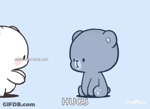 A Couple Of Teddy Bears Standing Next To Each Other And Hugging Each Other . GIF