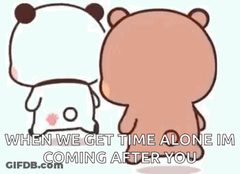 A Couple Of Teddy Bears Standing Next To Each Other And Talking . GIF